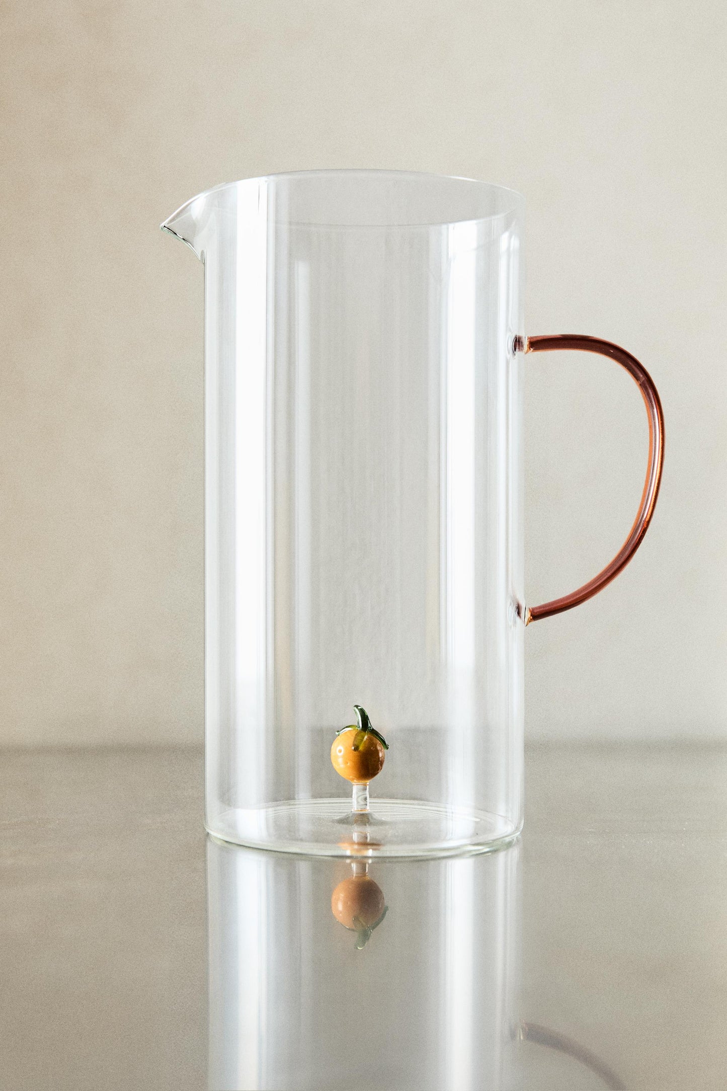 Drinkware, pitcher, borosilicate glass, orange figure inside