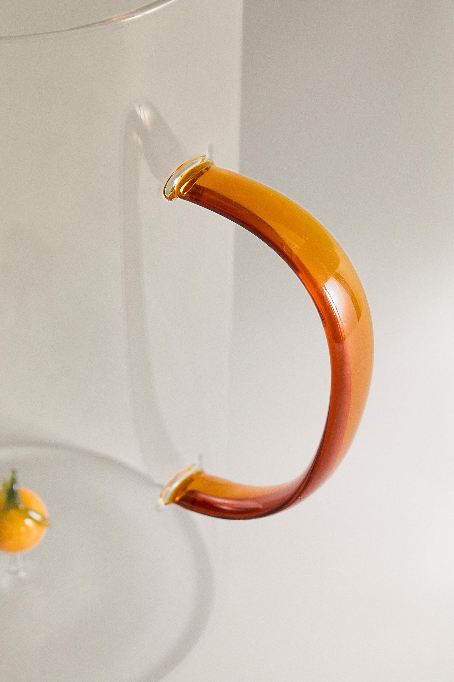 Drinkware, pitcher, borosilicate glass, orange figure inside