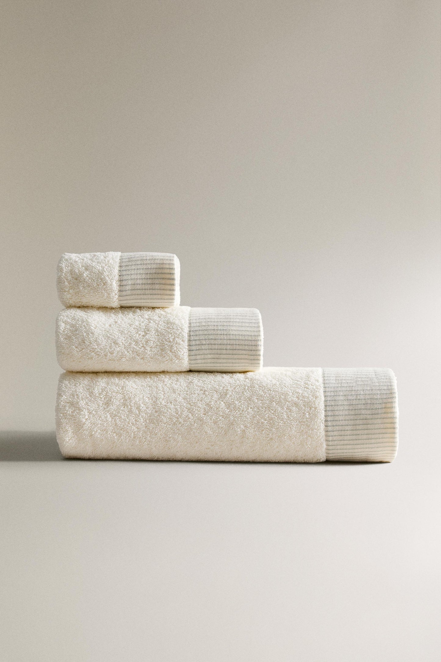 Towel, cotton terrycloth, striped border, ivory