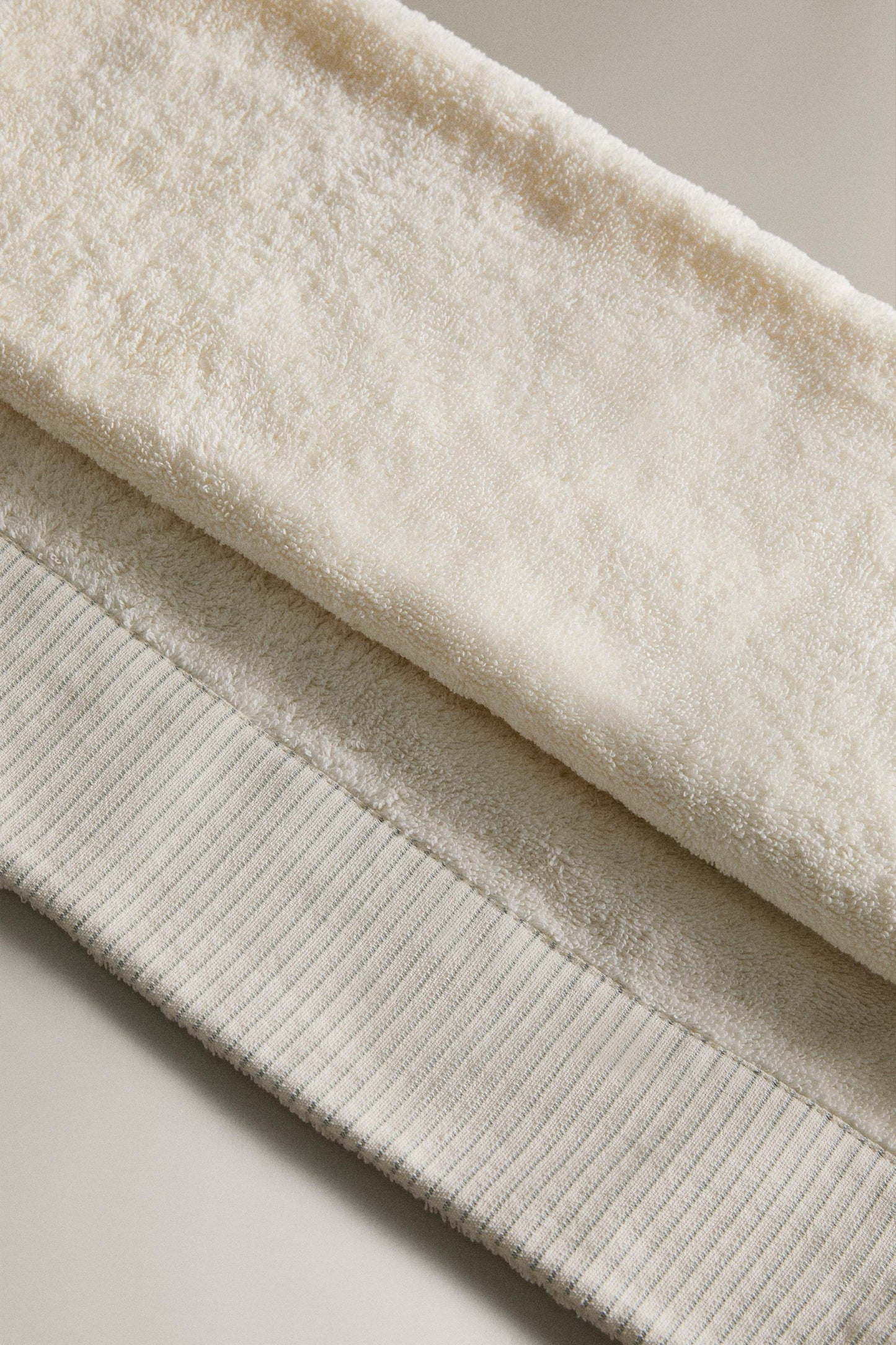 Towel, cotton terrycloth, striped border, ivory