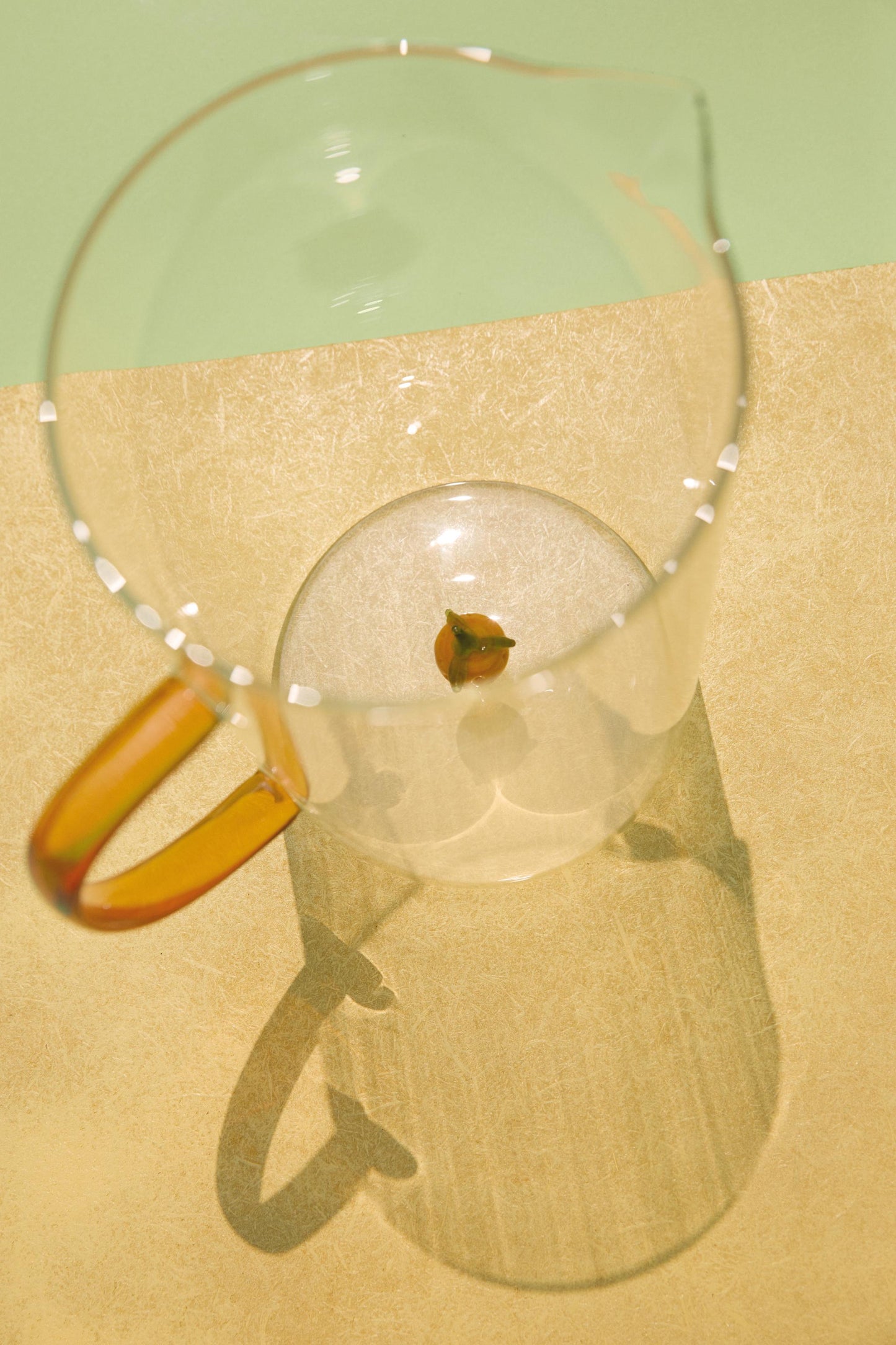 Drinkware, pitcher, borosilicate glass, orange figure inside